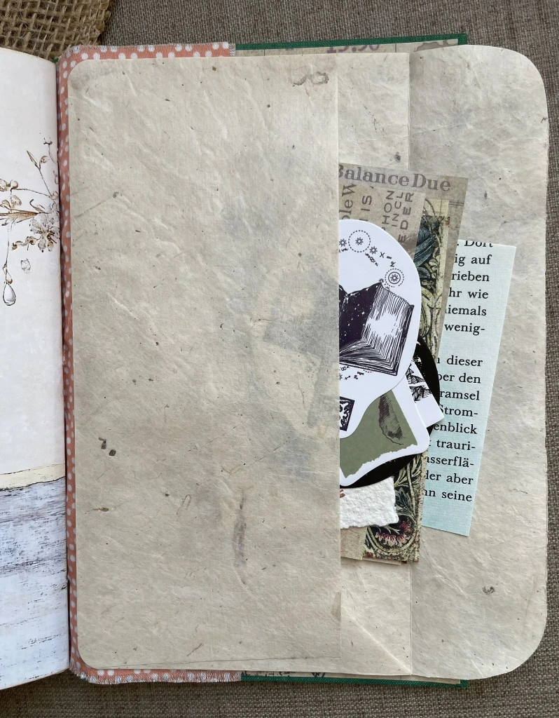 Journal-with-ephemera.webp
